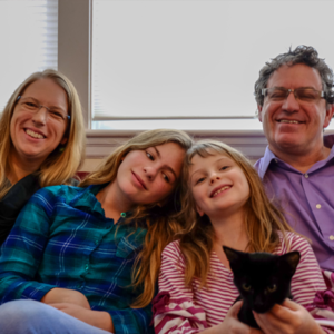 Suzanne with her husband and daughters