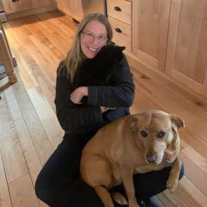 Suzanne at home with her dog